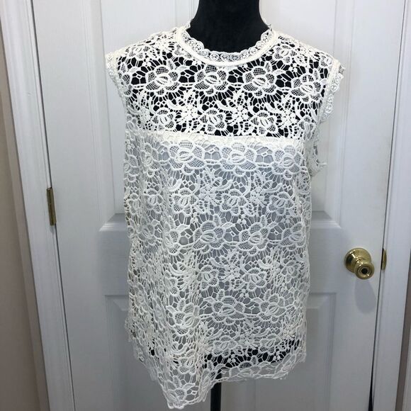 Nanette Lepore Tops - Nanette Lepore cream crocheted sleeveless top size large